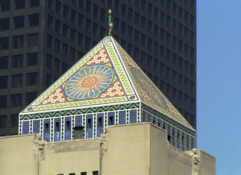 The pyramid atop the Los Angeles Central Library, topped with a golden hand, entwined by the serpent of knowledge, holding aloft the torch of knowledge.
